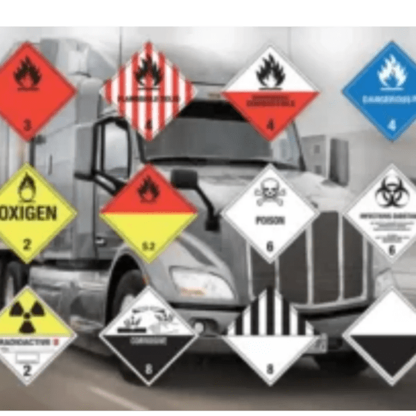 A truck with many different hazard signs on it.